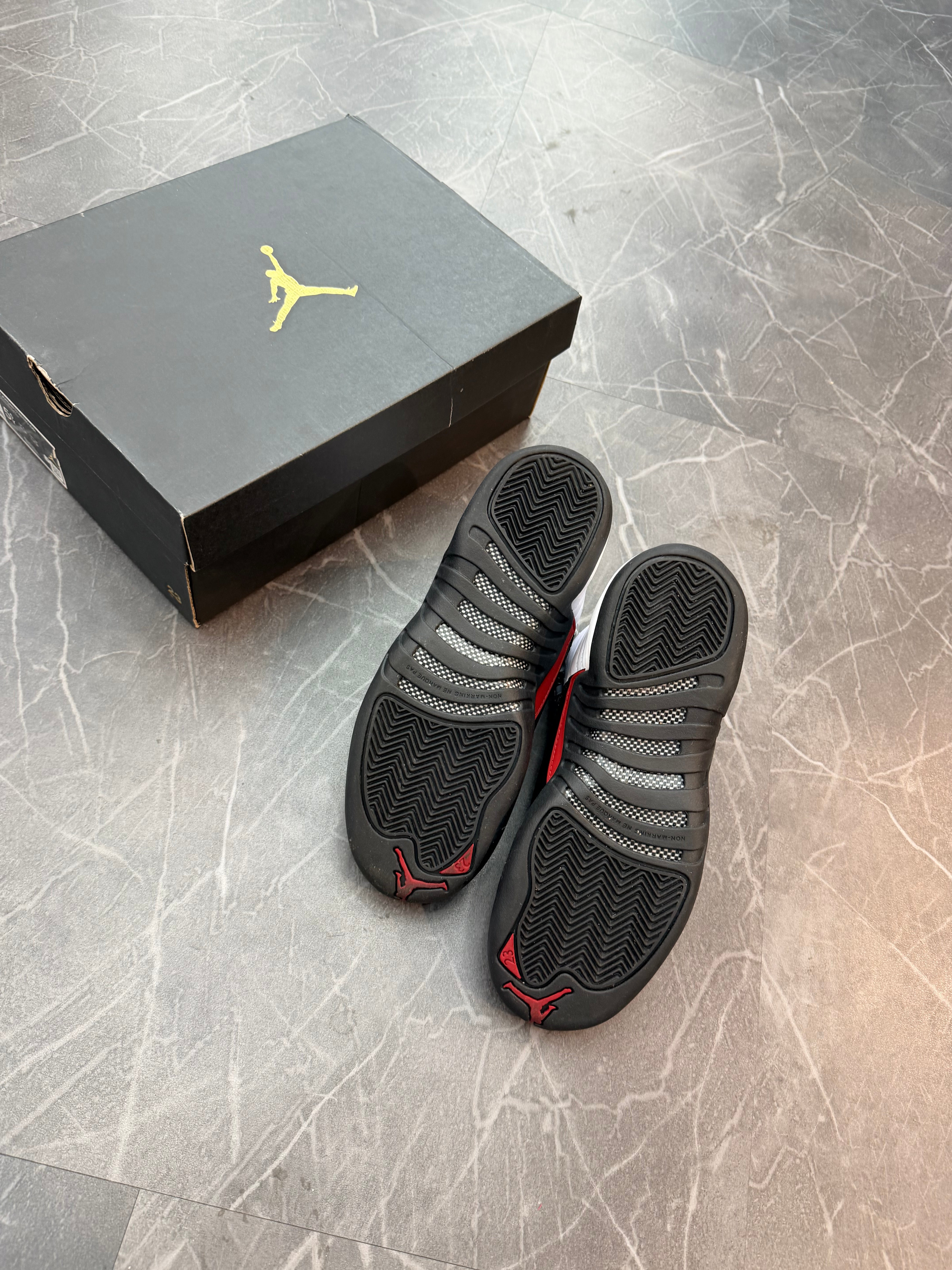 Jordan 12 “Taxi Flip”