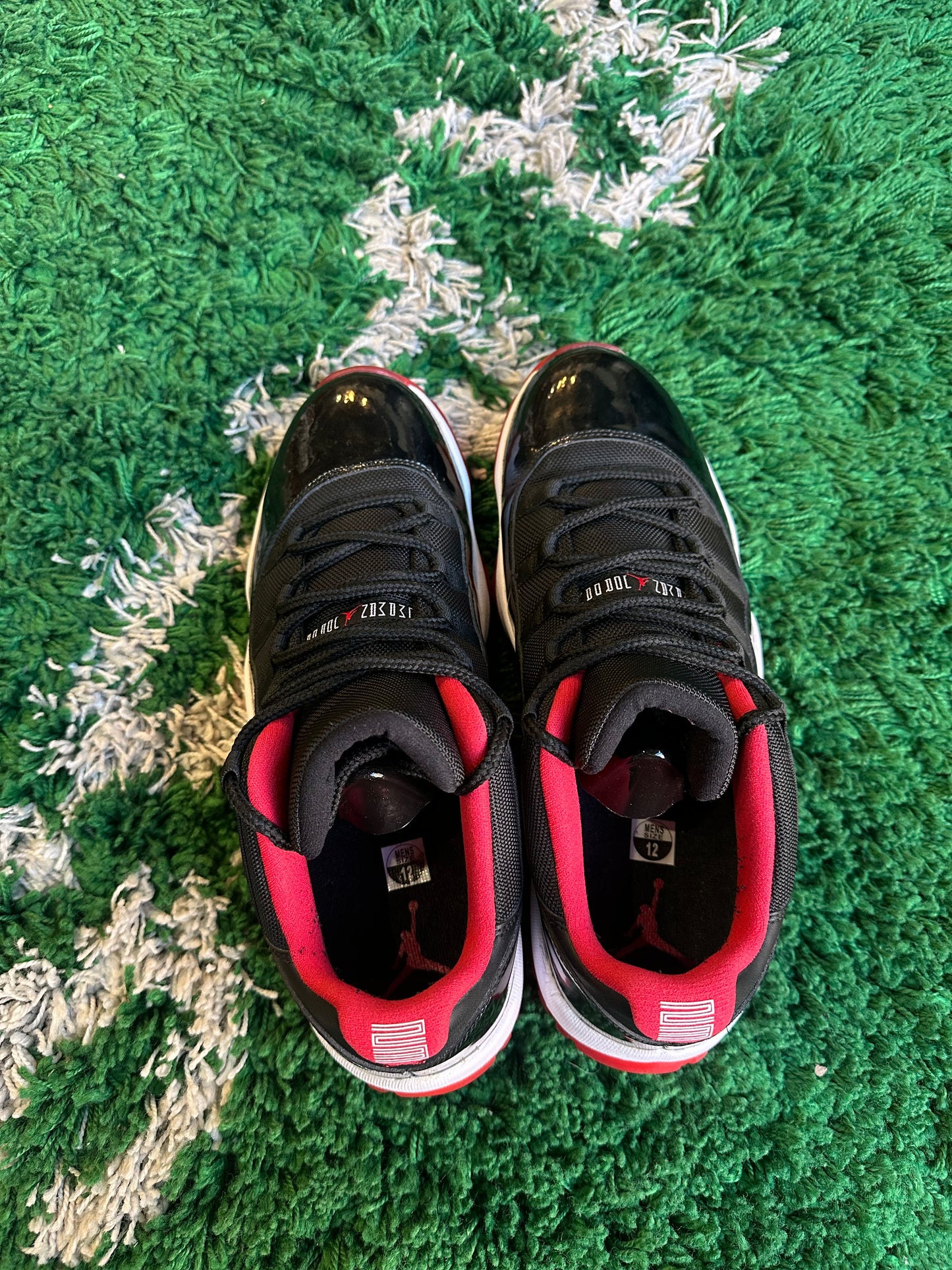 Jordan 11 Low “Bred”