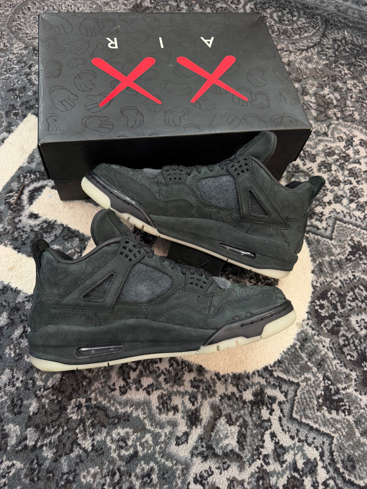 Jordan 4 x Kaws “Black”