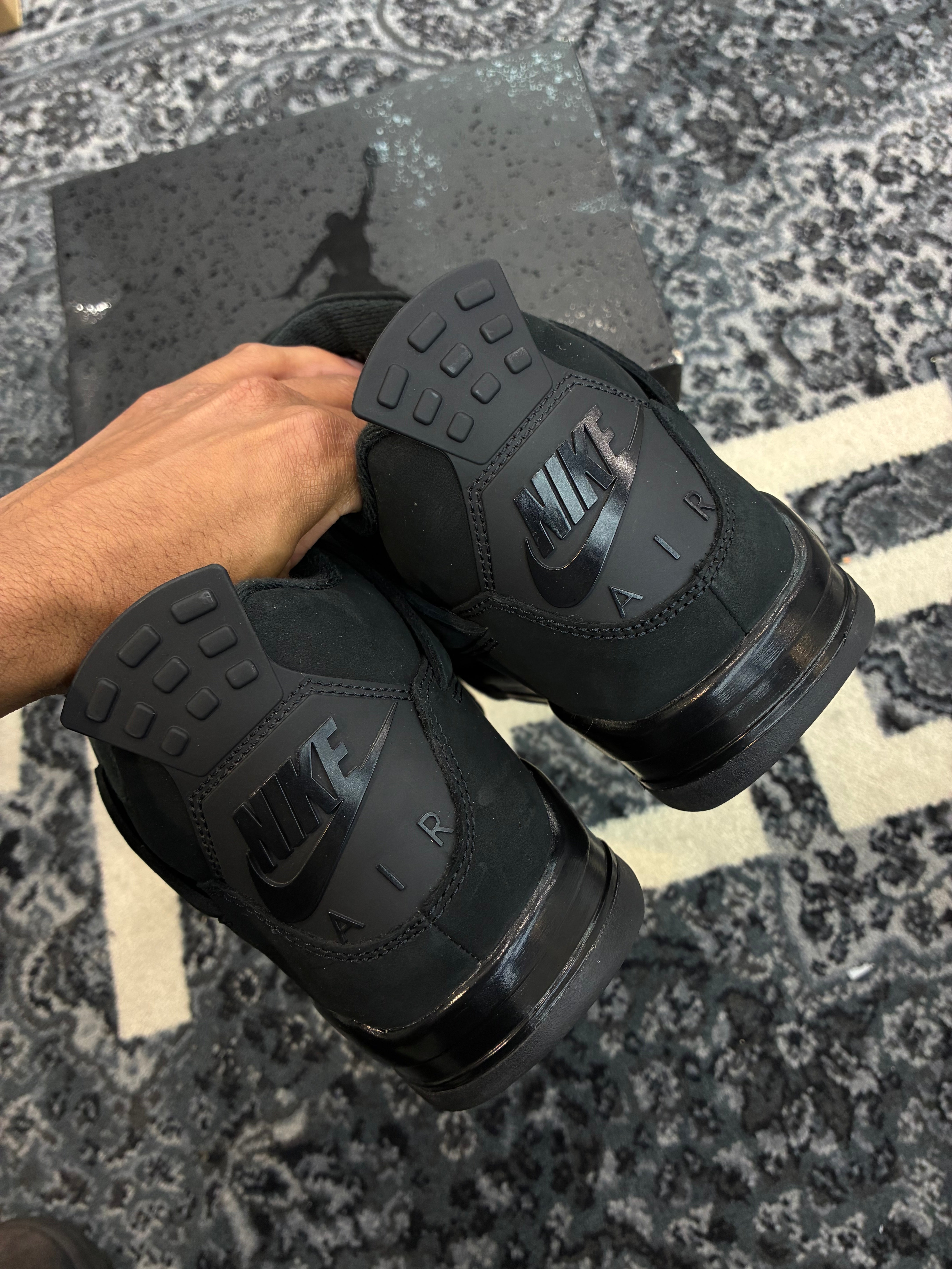 Jordan 4 “Black Cat”