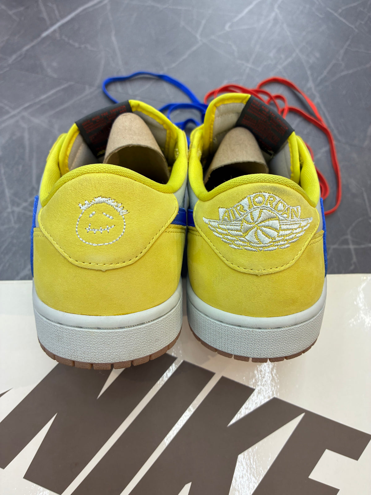 Travis Scott Jordan 1 Low “Canary”
