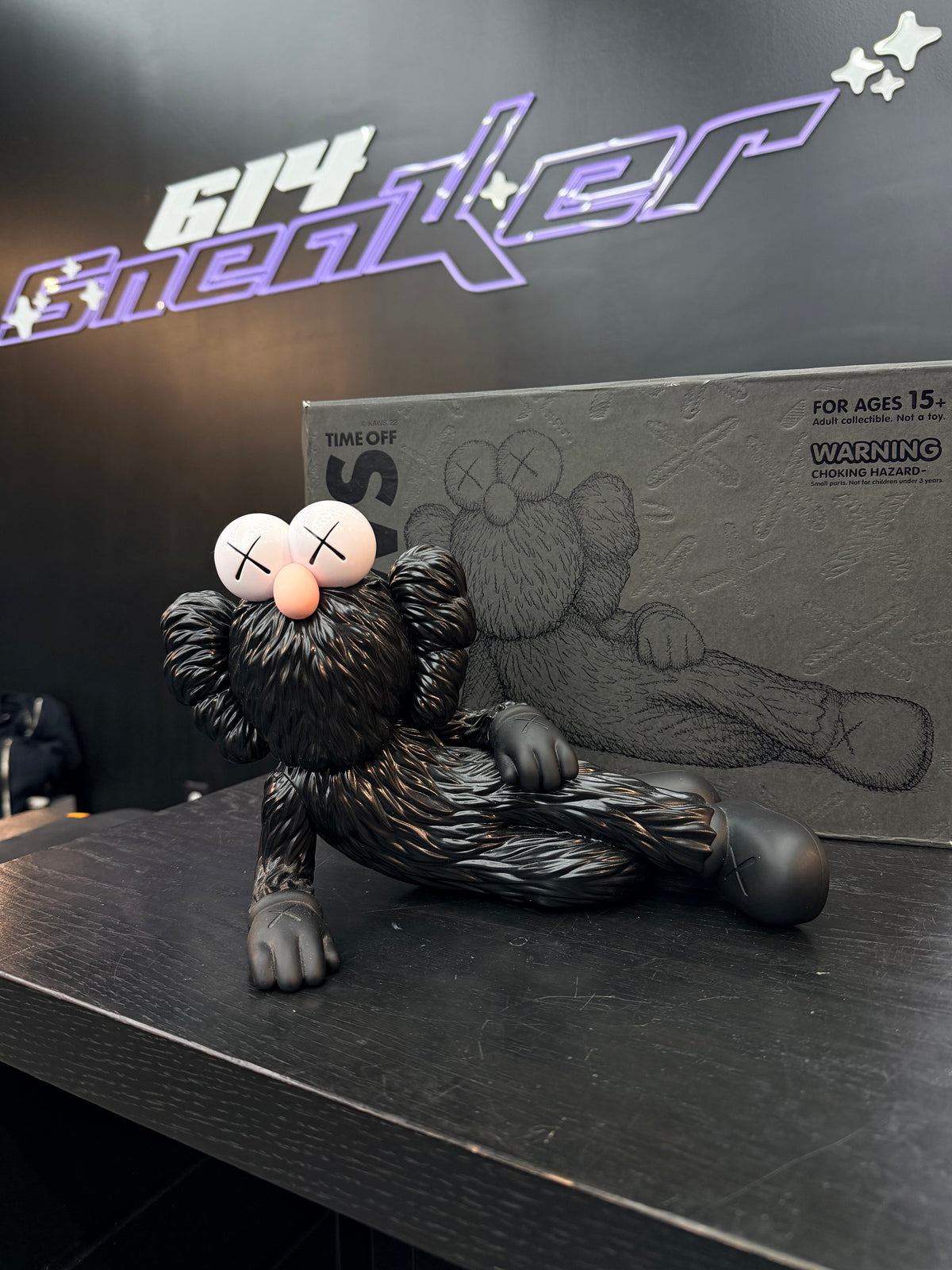 KAWS TIME OFF Vinyl Figure “Black” (Size OS) - Image 1