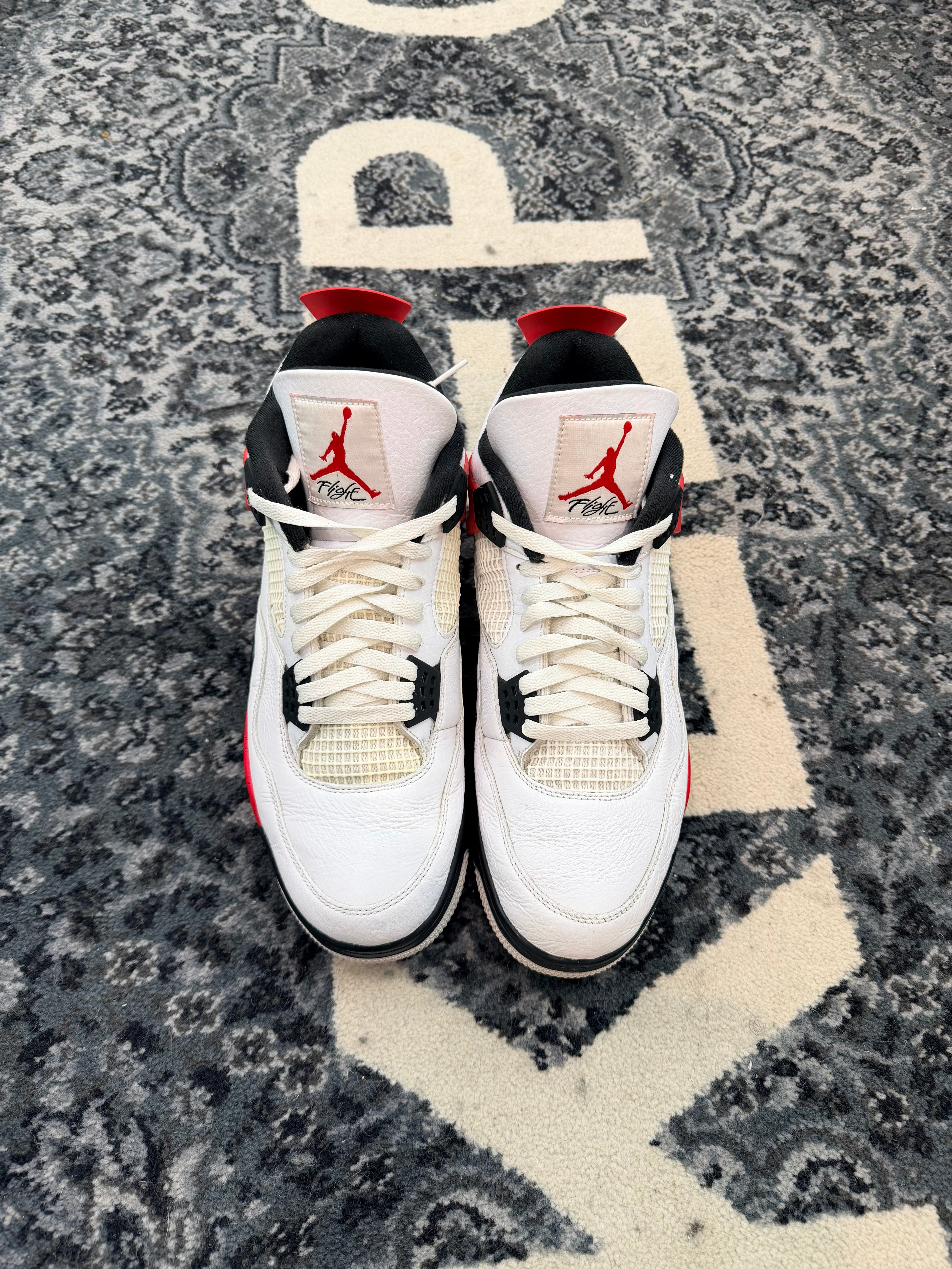 Jordan 4 “Red Cement”
