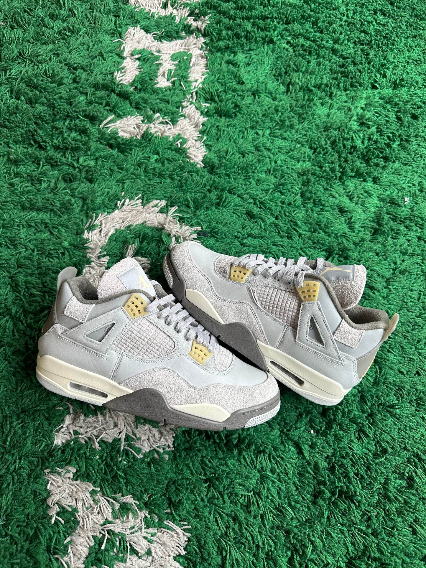 Jordan 4 “Craft Photon Dust”