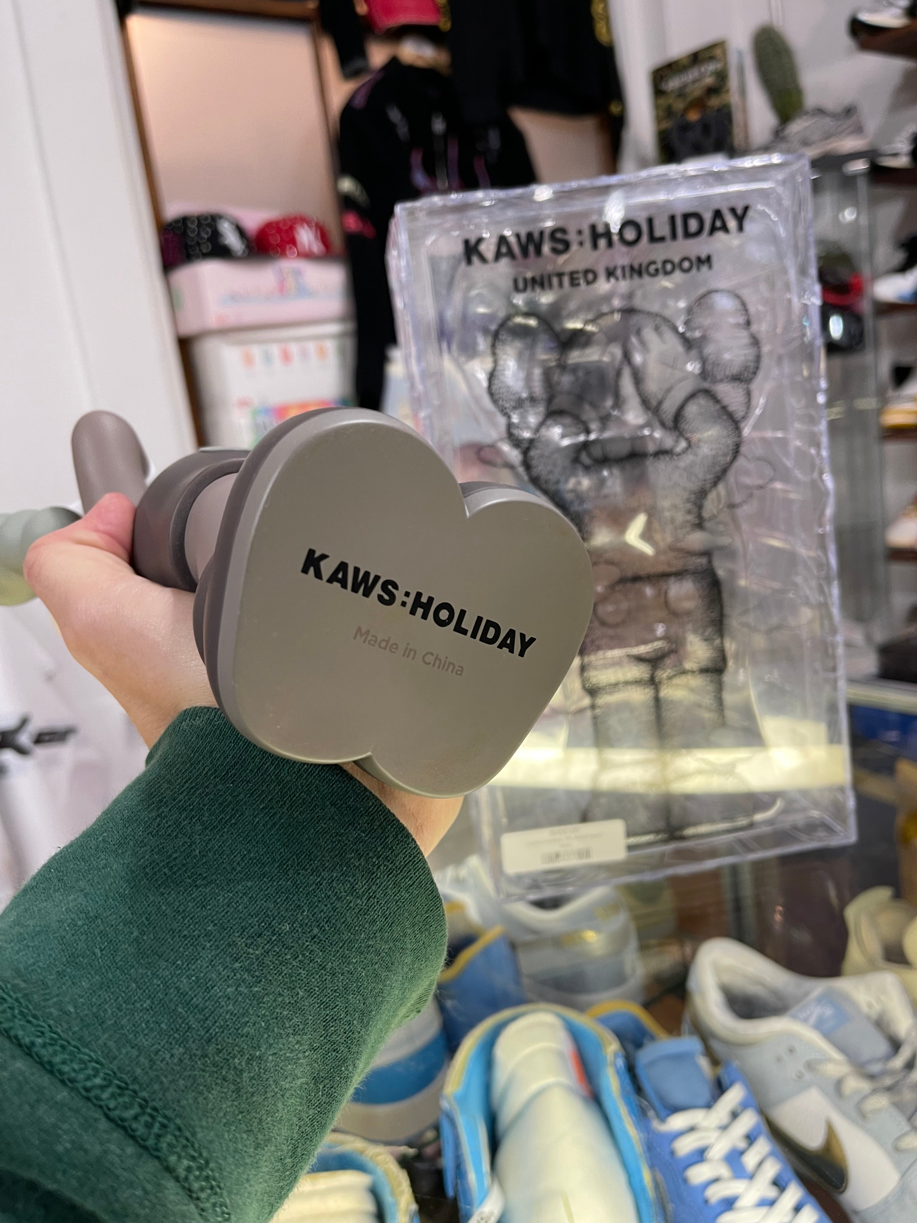Kaws Holiday UK Vinyl Figure “Brown”