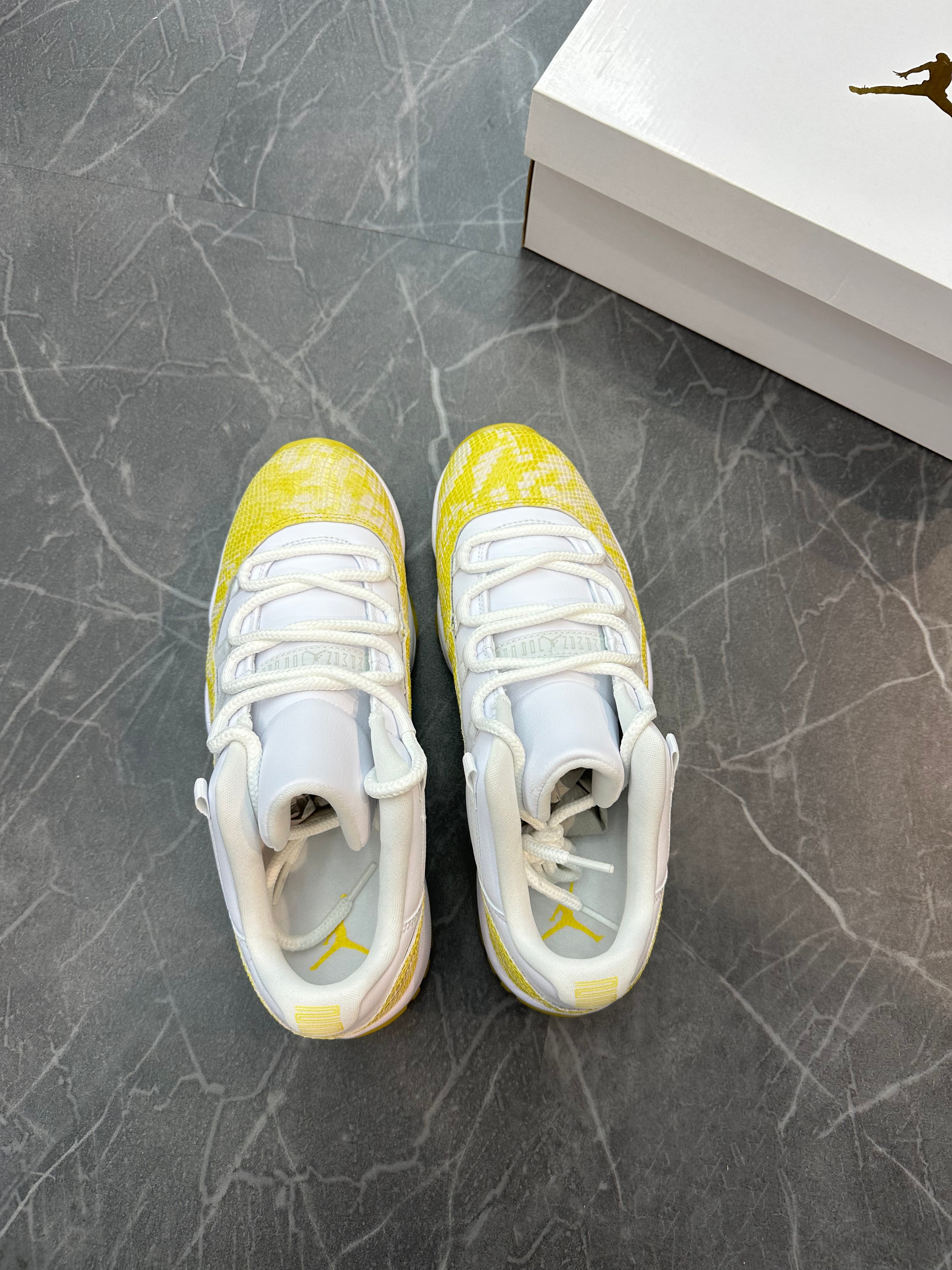 Jordan 11 Low “Yellow Snakeskin”