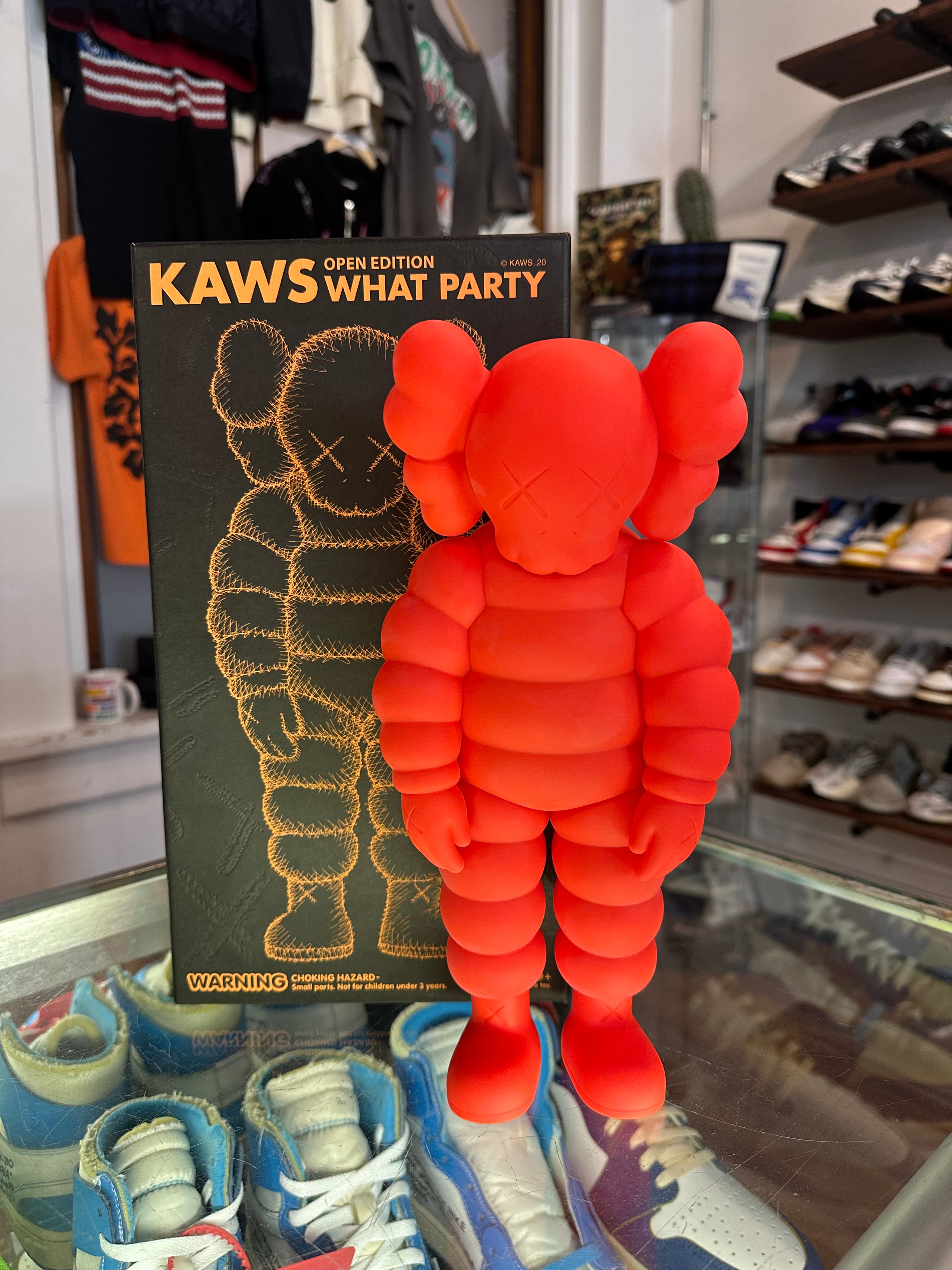 KAWS What Party Vinyl Figure “Orange”