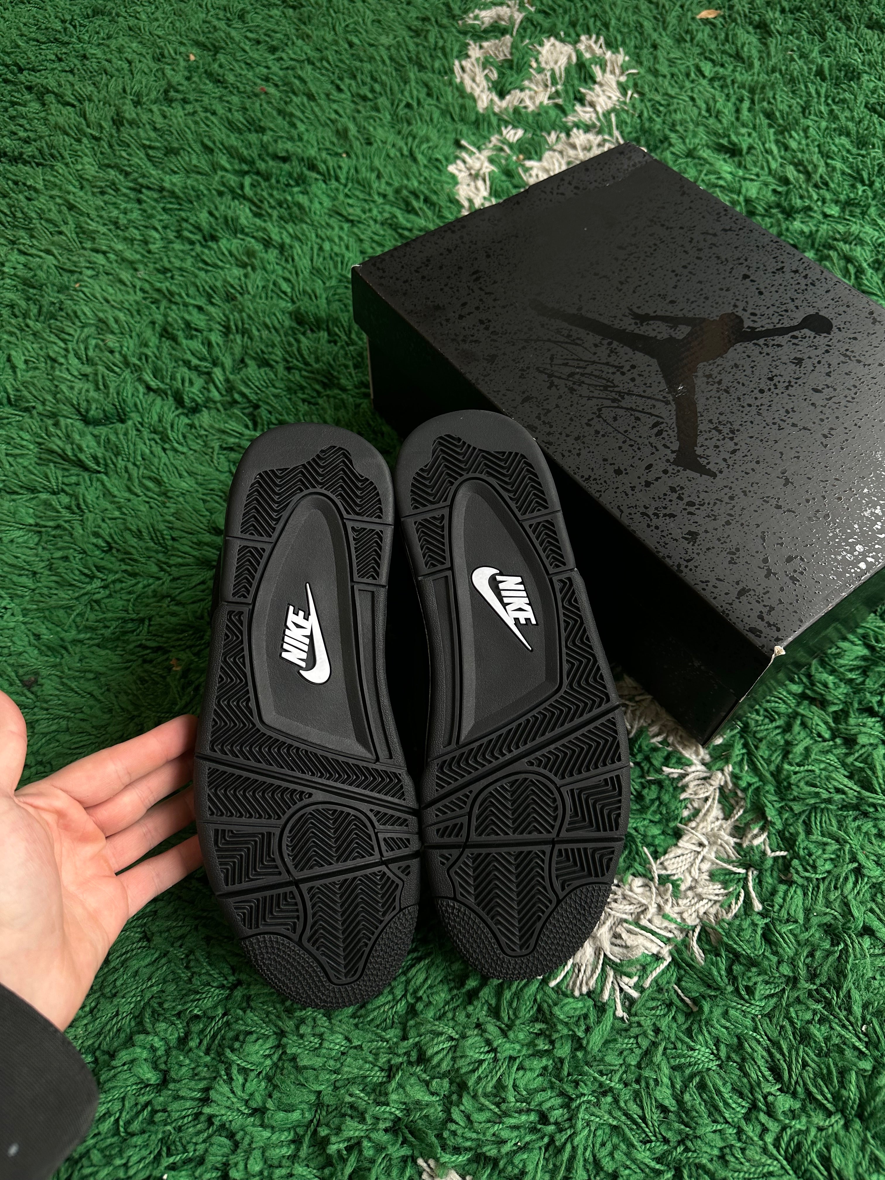 Jordan 4 “Black Cat” (2025)