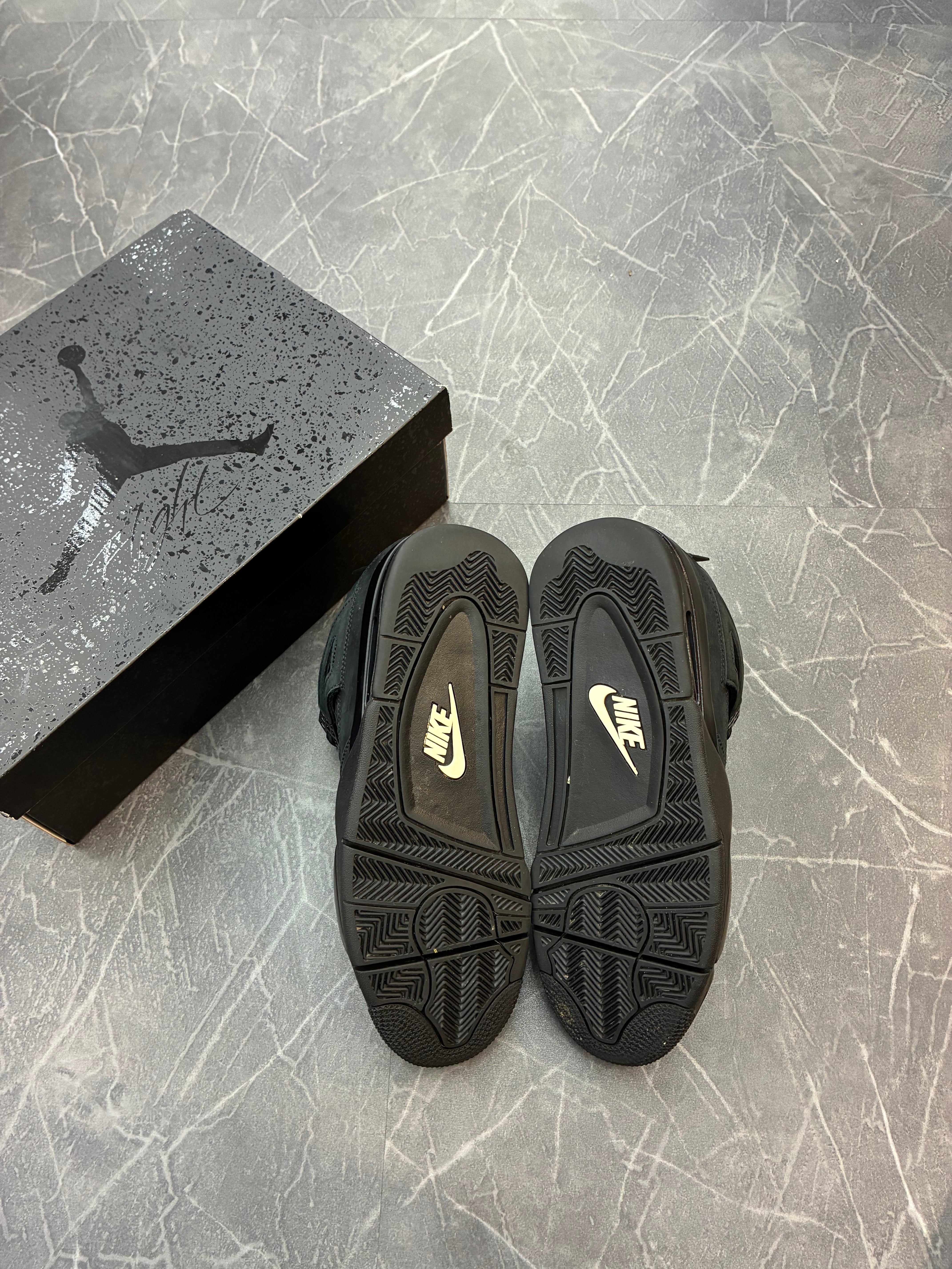 Jordan 4 “Black Cat”