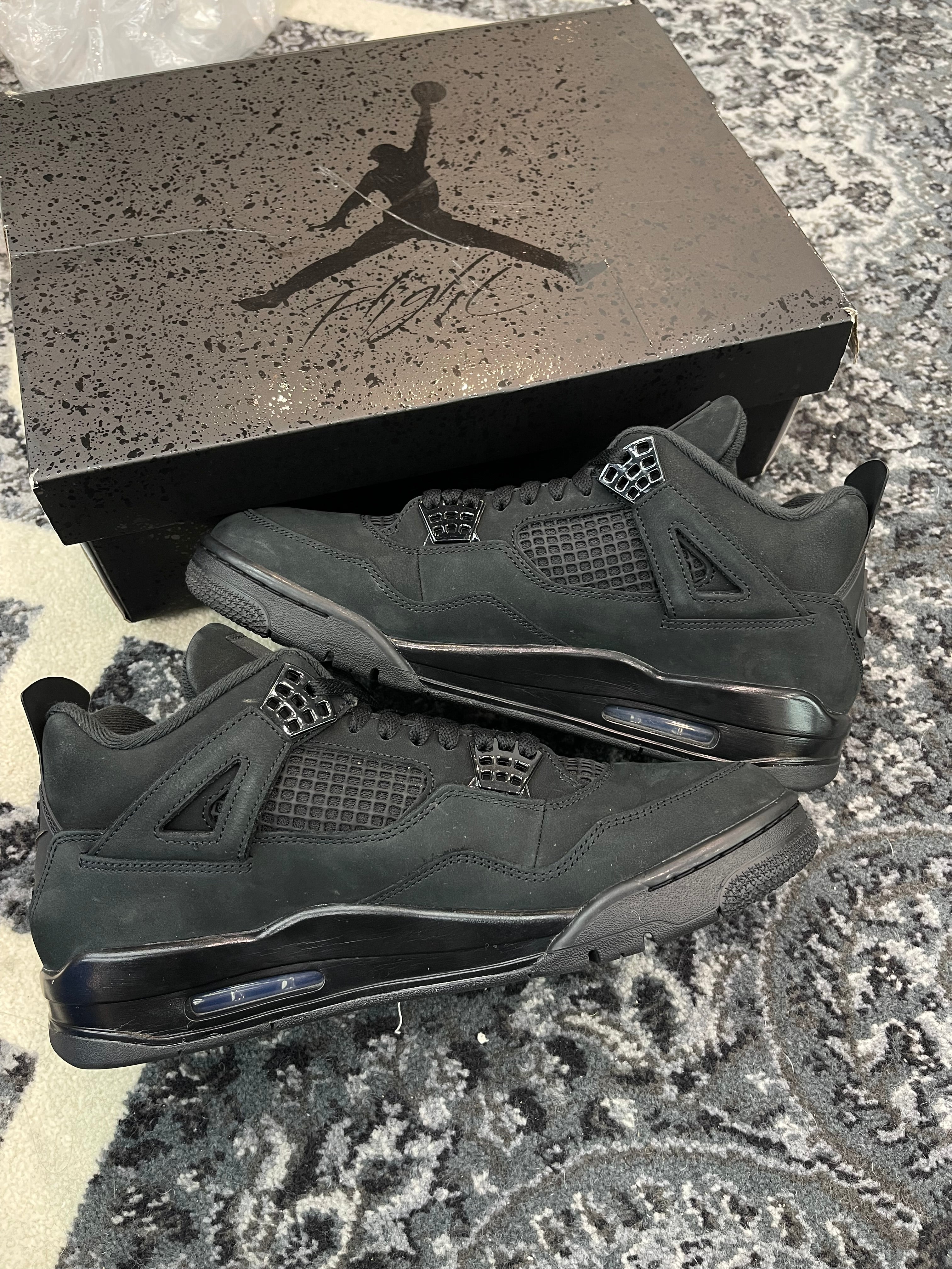 Jordan 4 “Black Cat” (2025)