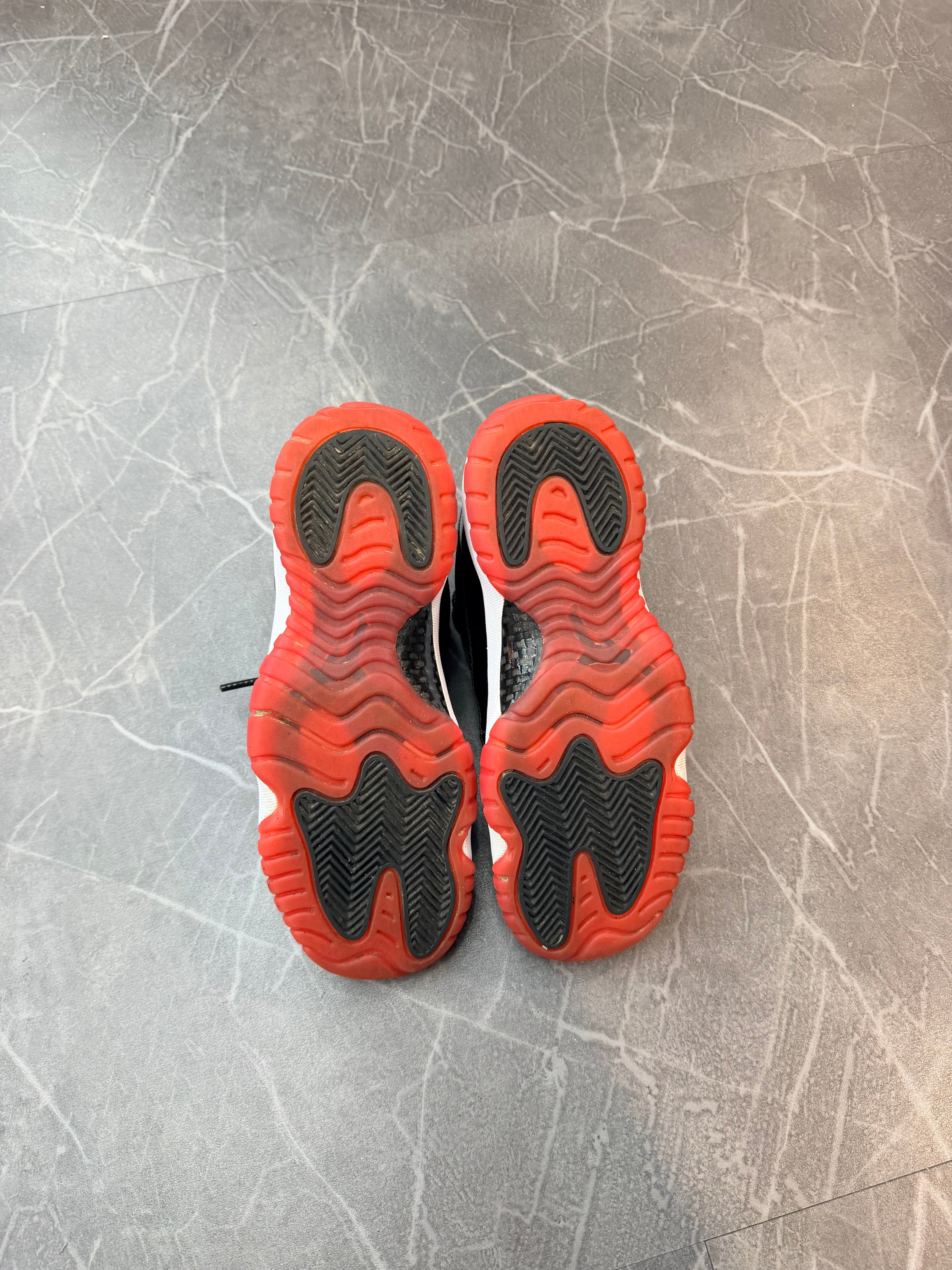 Jordan 11 Low “Bred”