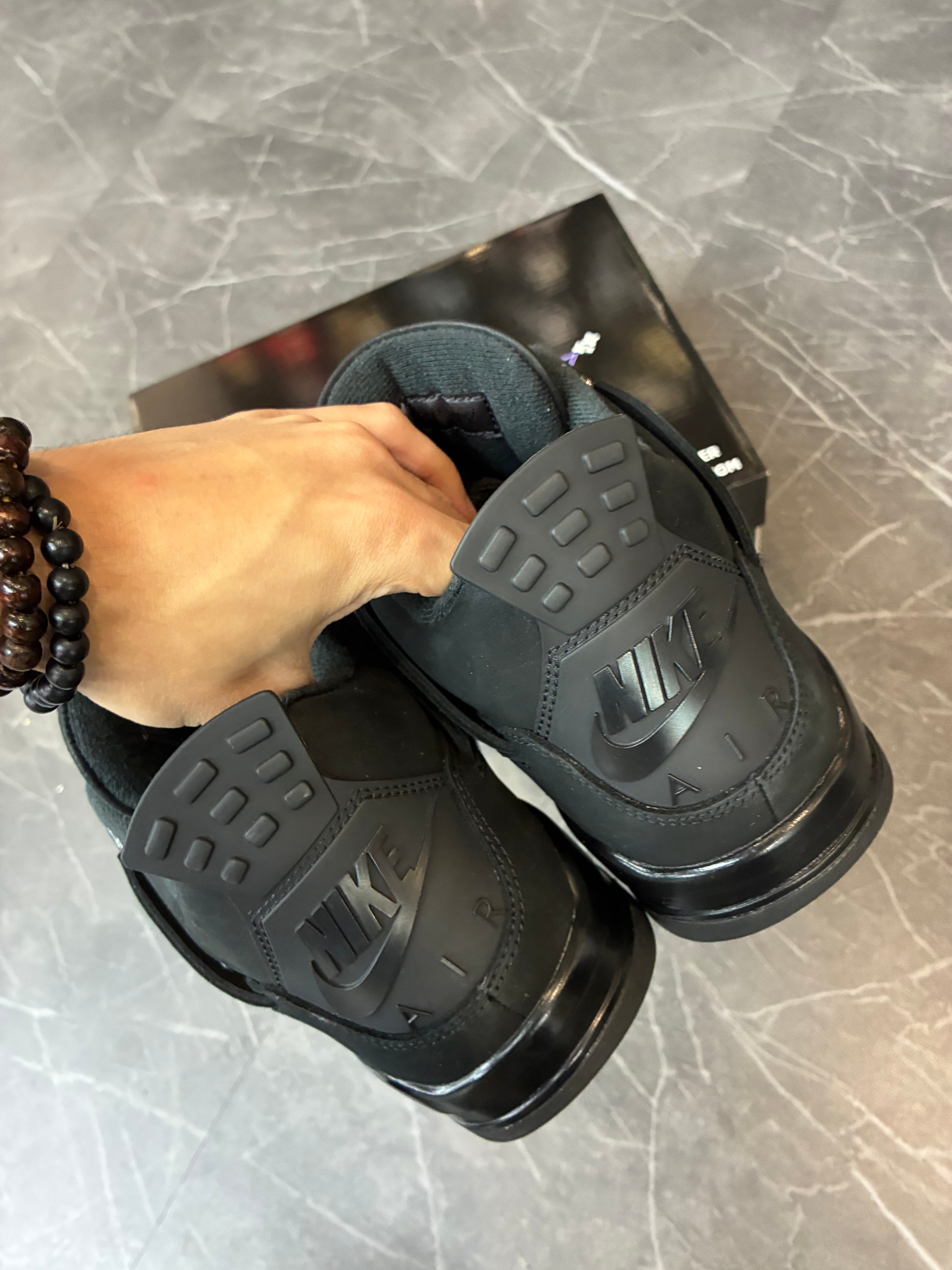 Jordan 4 “Black Cat”