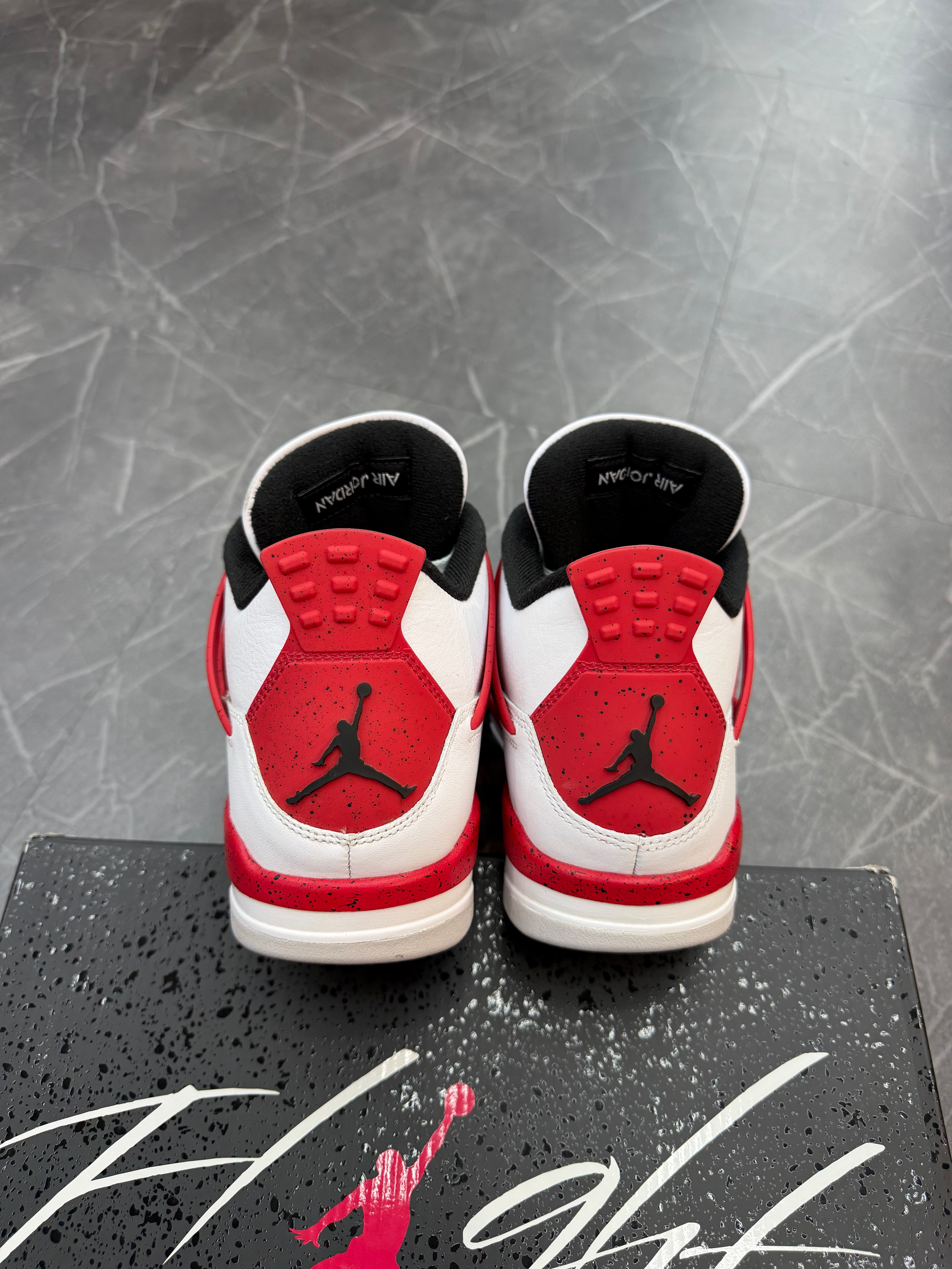 Jordan 4 “Red Cement”