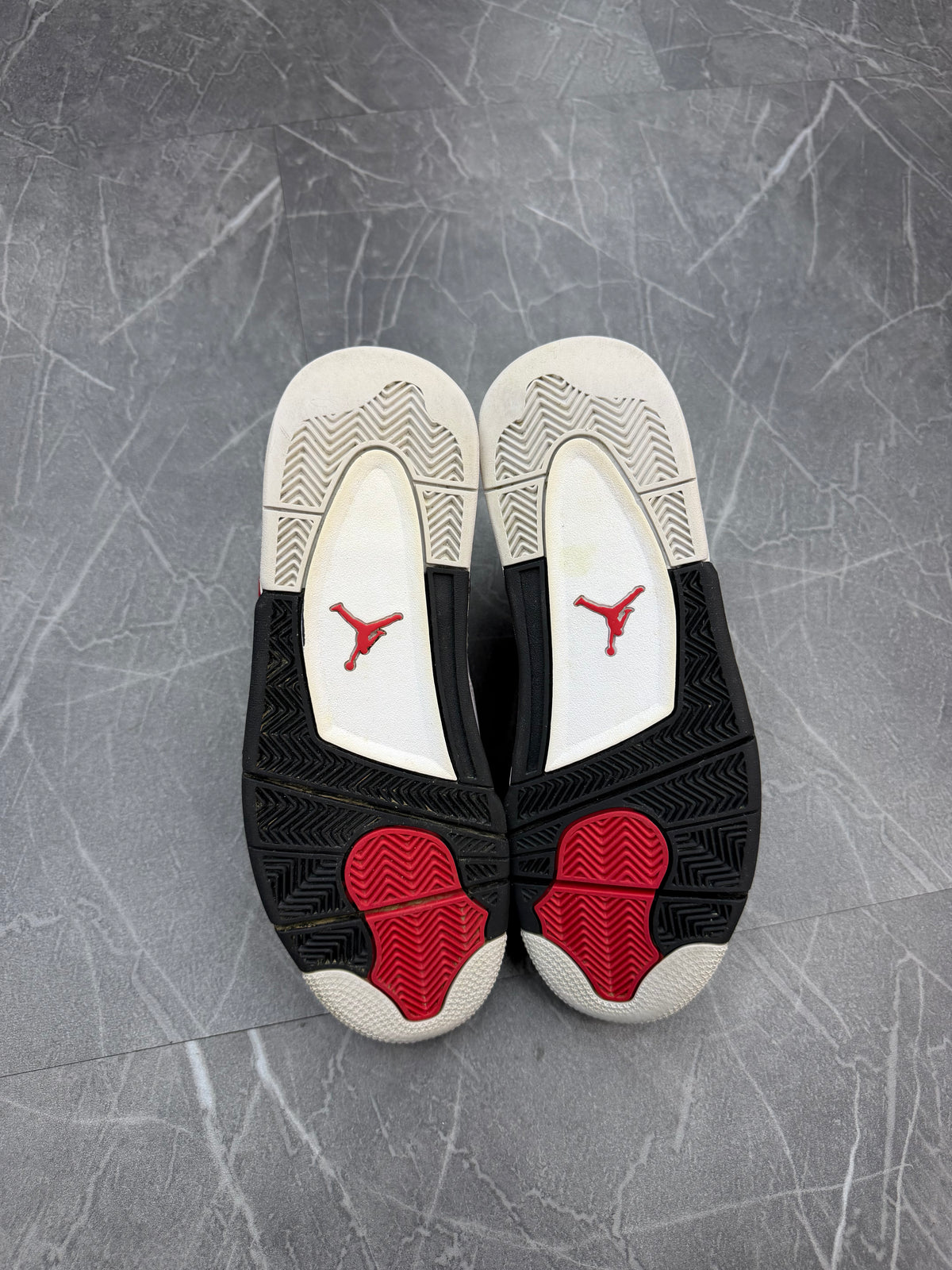 Jordan 4 “Red Cement”
