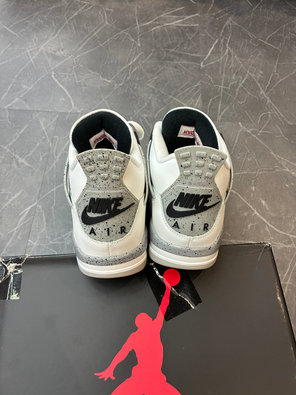 Jordan 4 “White Cement”