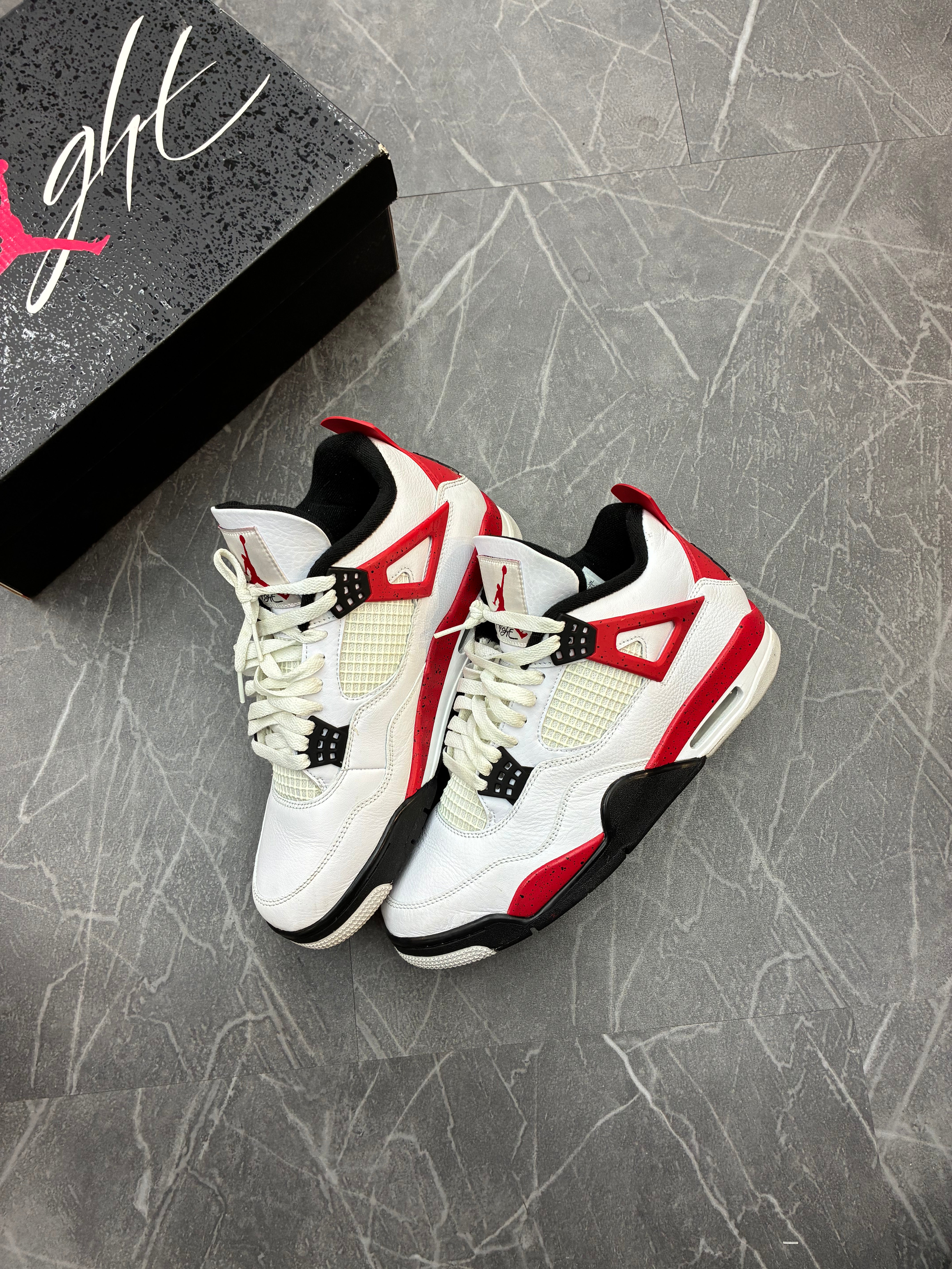 Jordan 4 “Red Cement”