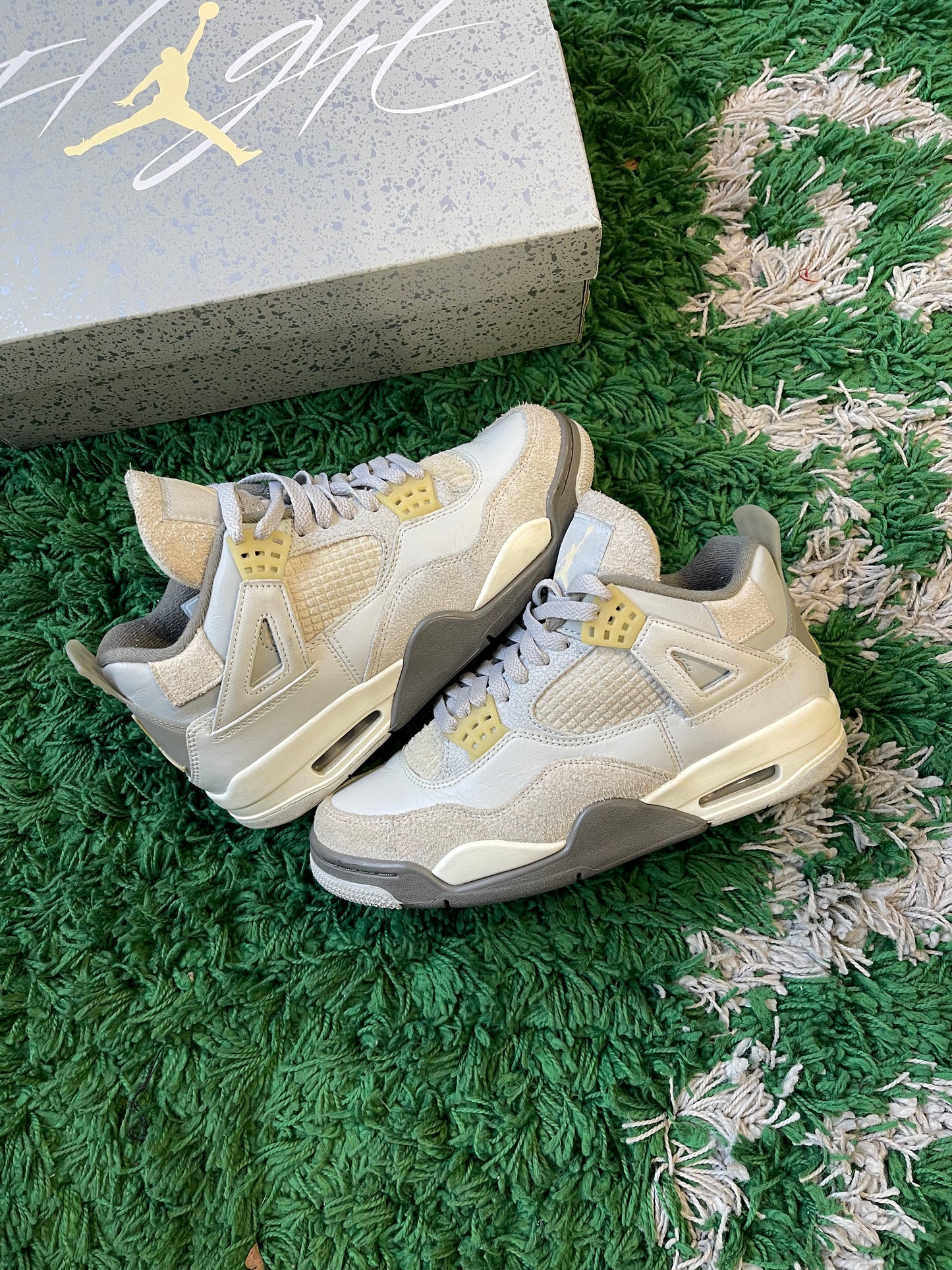 Jordan 4 “Photon Dust”