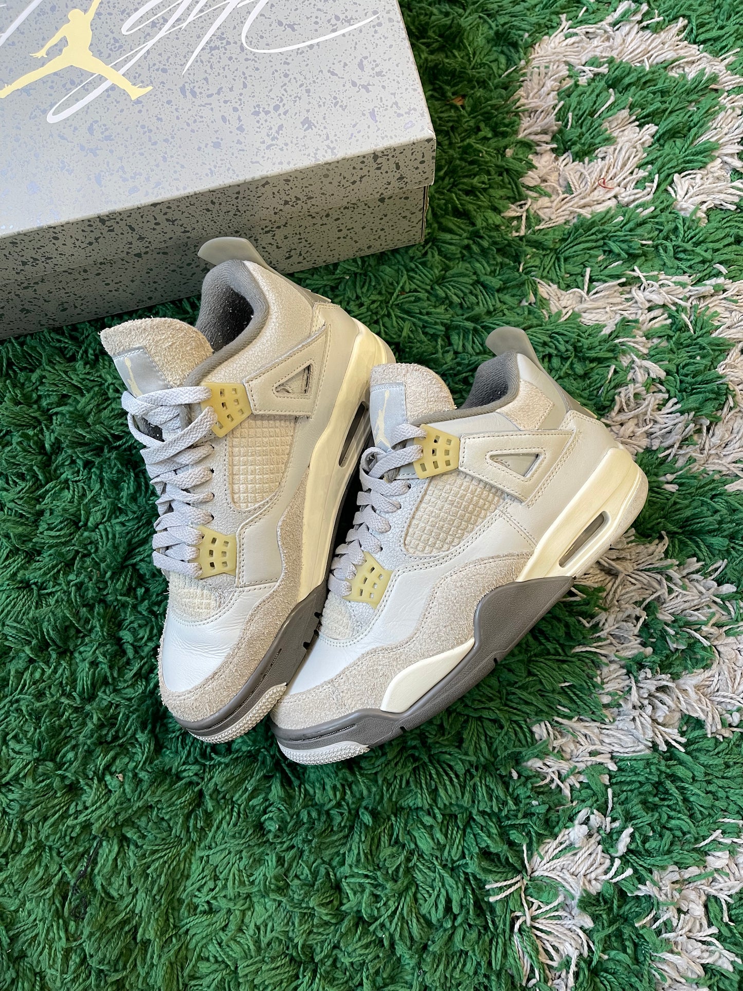 Jordan 4 “Photon Dust”