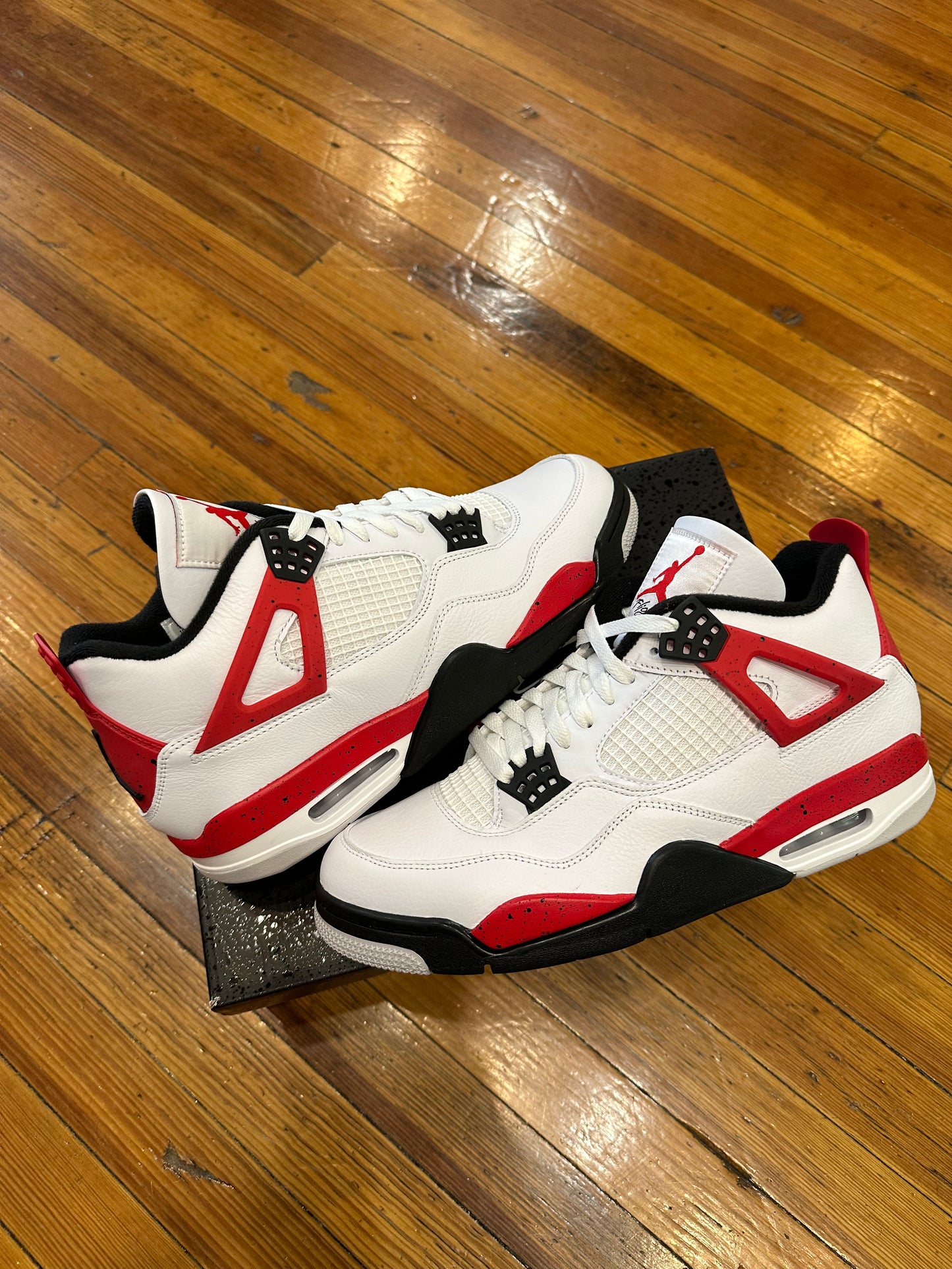 Jordan 4 “Red Cement”