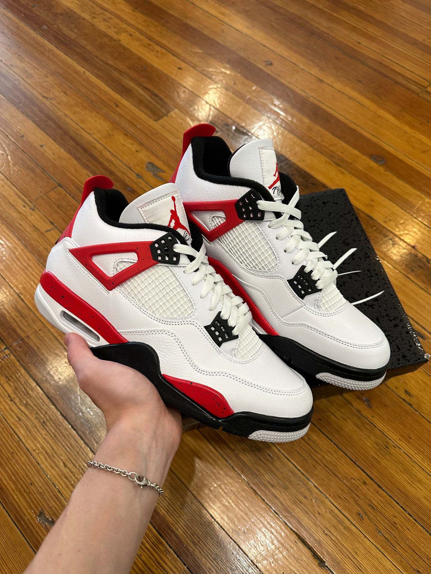 Jordan 4 “Red Cement”