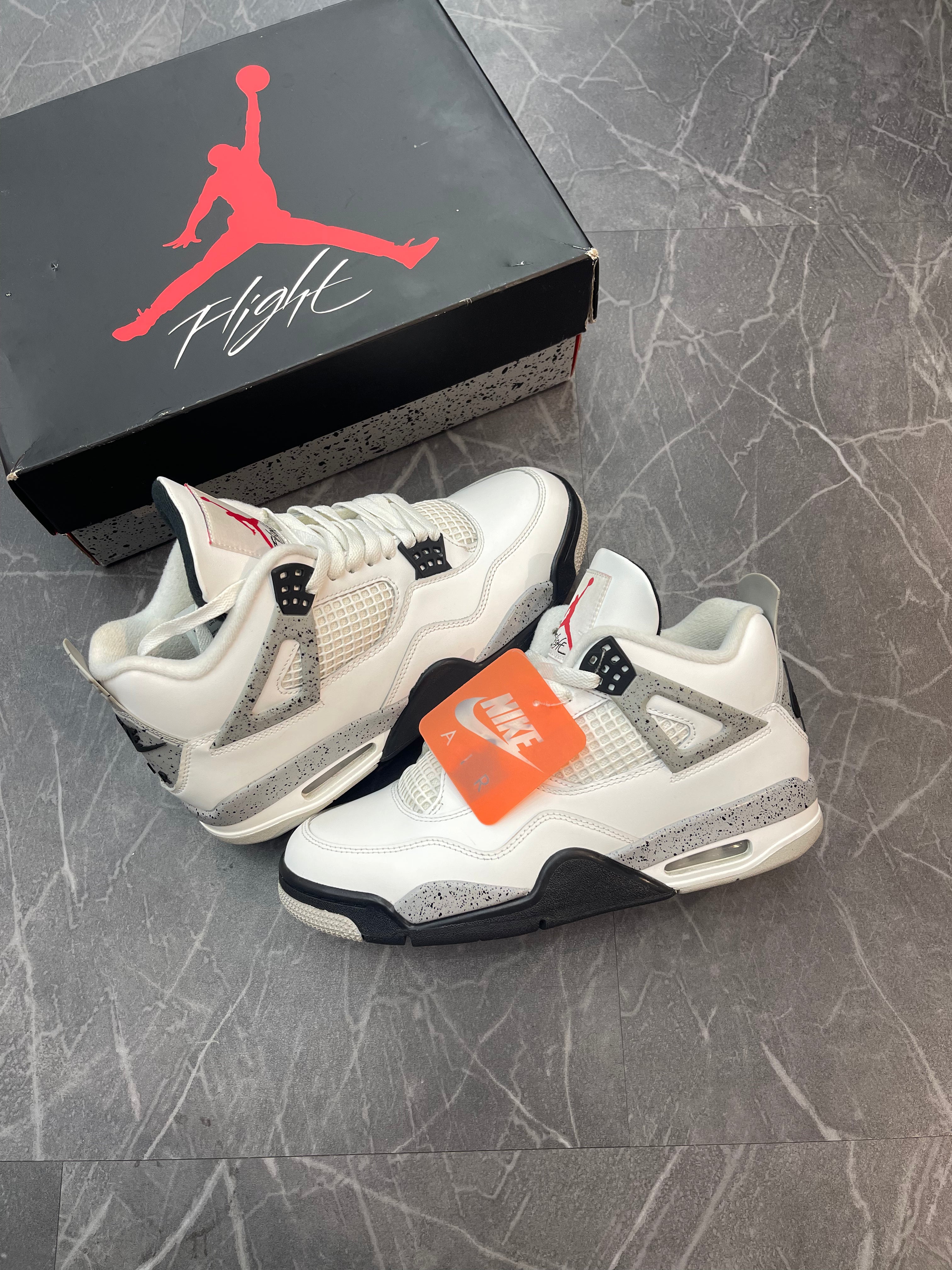 Jordan 4 “White Cement”