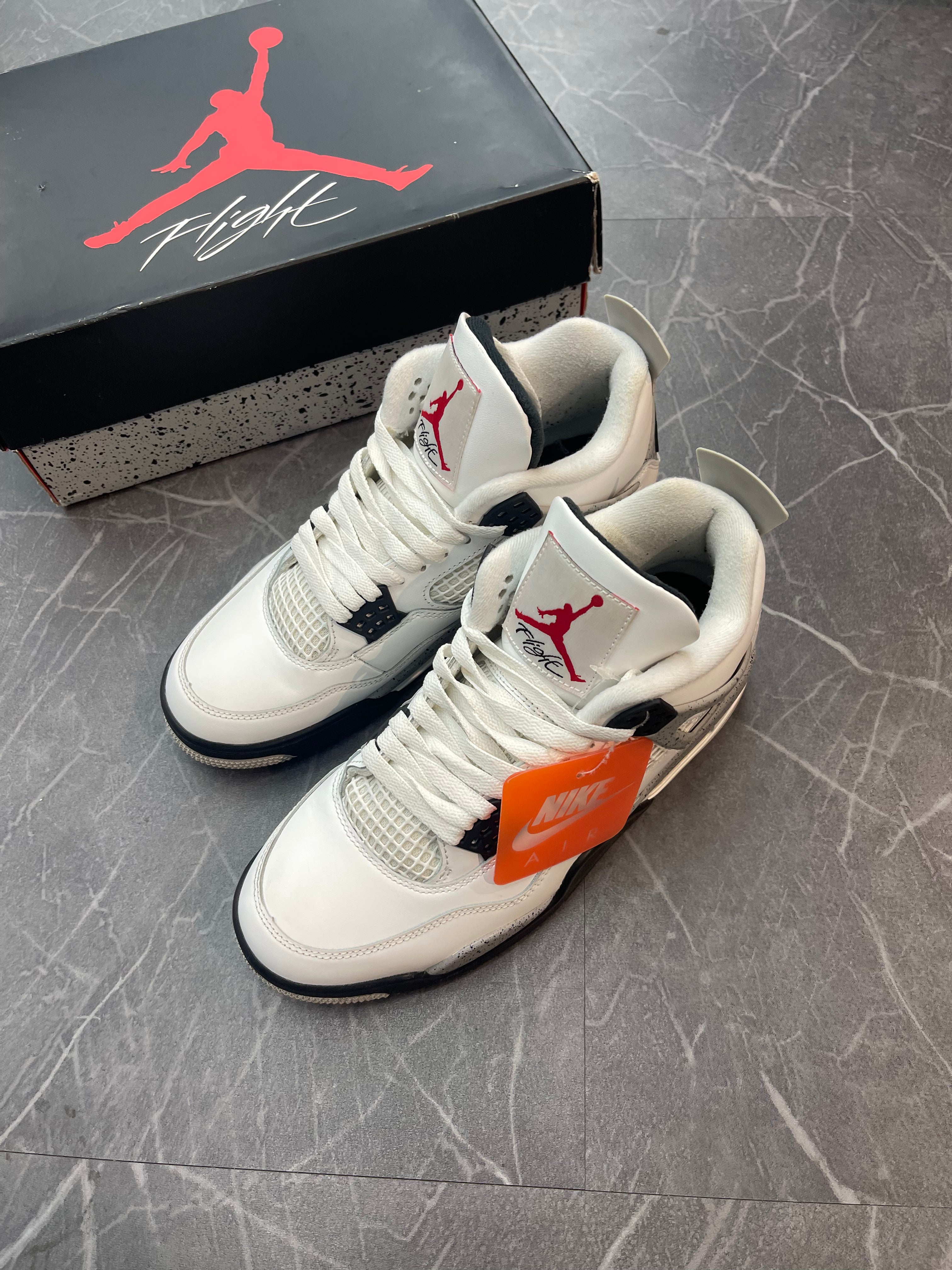 Jordan 4 “White Cement”