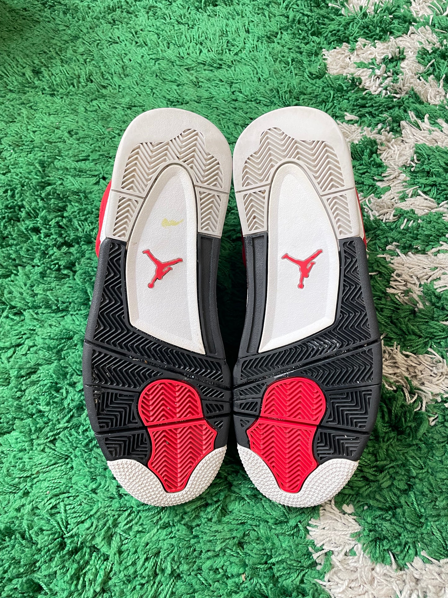 Jordan 4 “Red Cement”