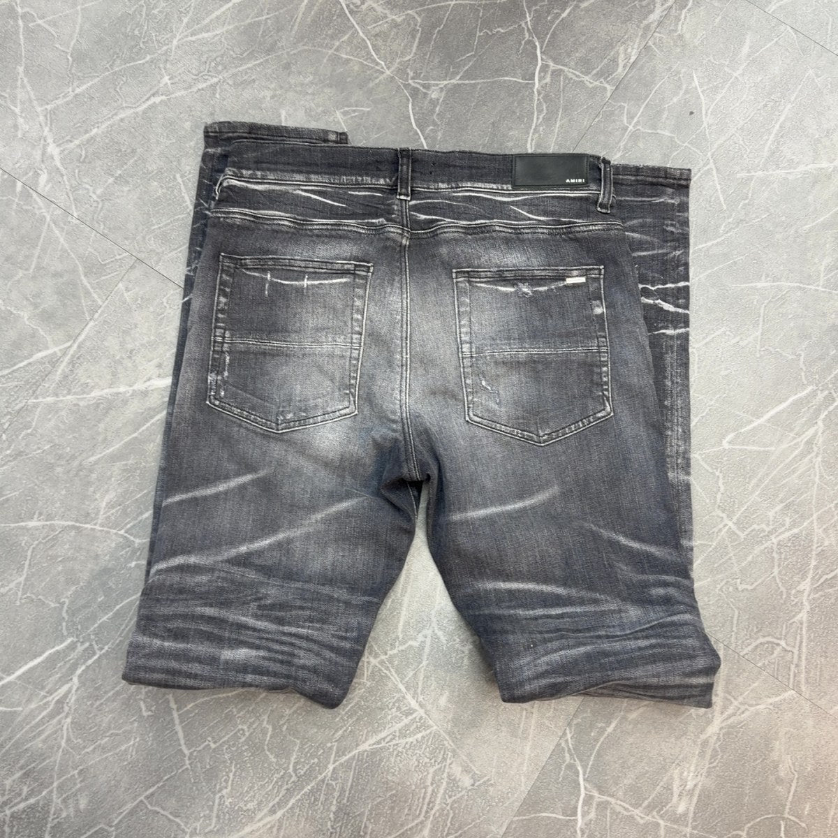 AMIRI Black Ripped Patch Denim - Image 2