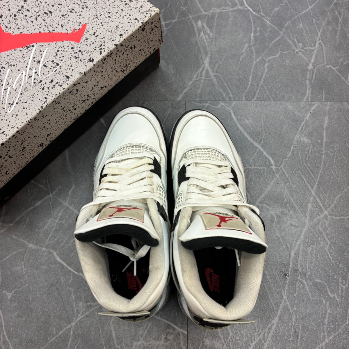 Jordan 4 Retro White Cement (2025) (Size 11) (Moderately Worn) - side