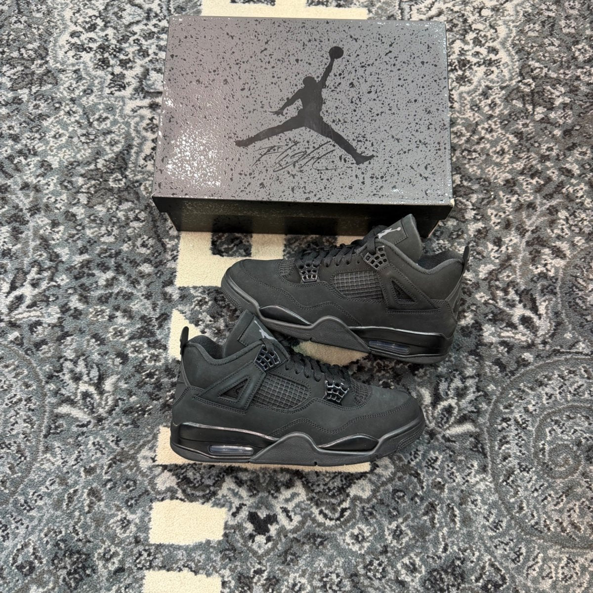 Jordan 4 Retro Black Cat (2025) - Image 1